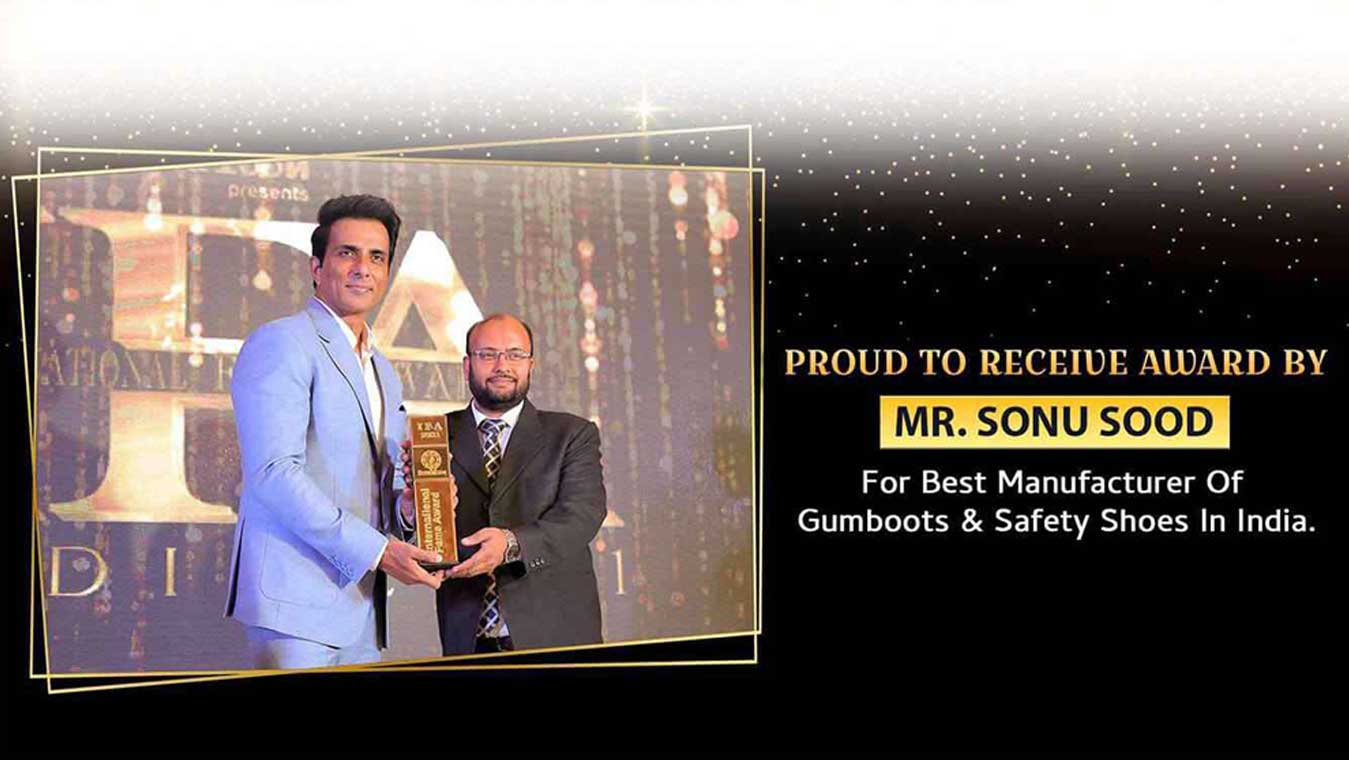 Received Award by Mr Sonu Sood for Best Manufacturer of Gumboots and safety shoes in Dalhousie